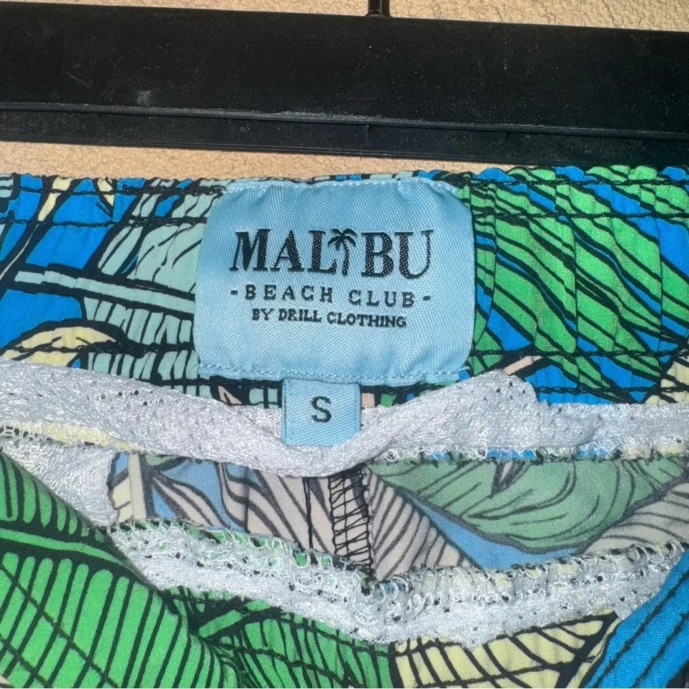 Blue and Green Board Shorts with Tropical Print